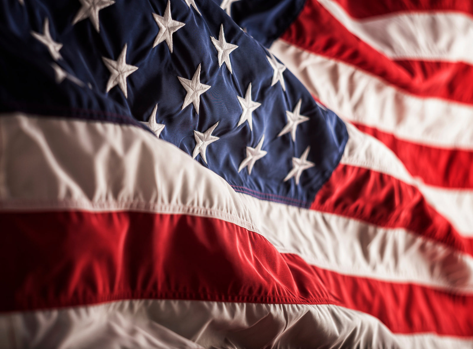 Close detail of a sewn flag